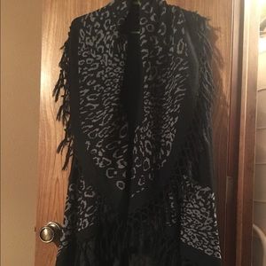 Grey and black poncho